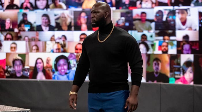 Omos is a former college basketball player and AJ Styles' bodyguard.